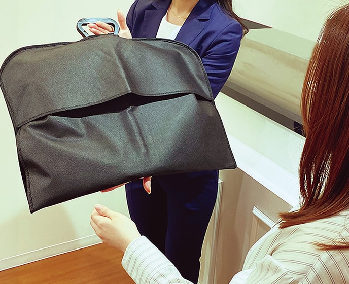 スーツ受取イメージ